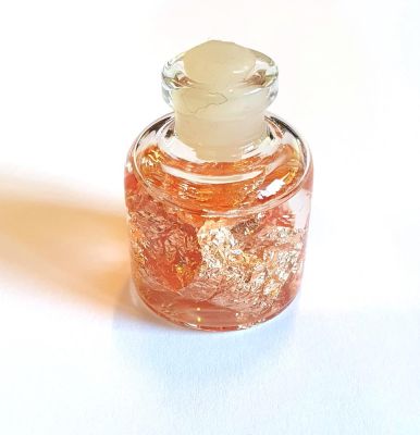 Copper leaf in glass bottle (S)